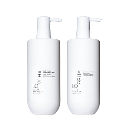 LOoPHA Oud + Amber Hand + Body Wash and LOoPHA Oud + Amber Hand + Body Water Cream bottles